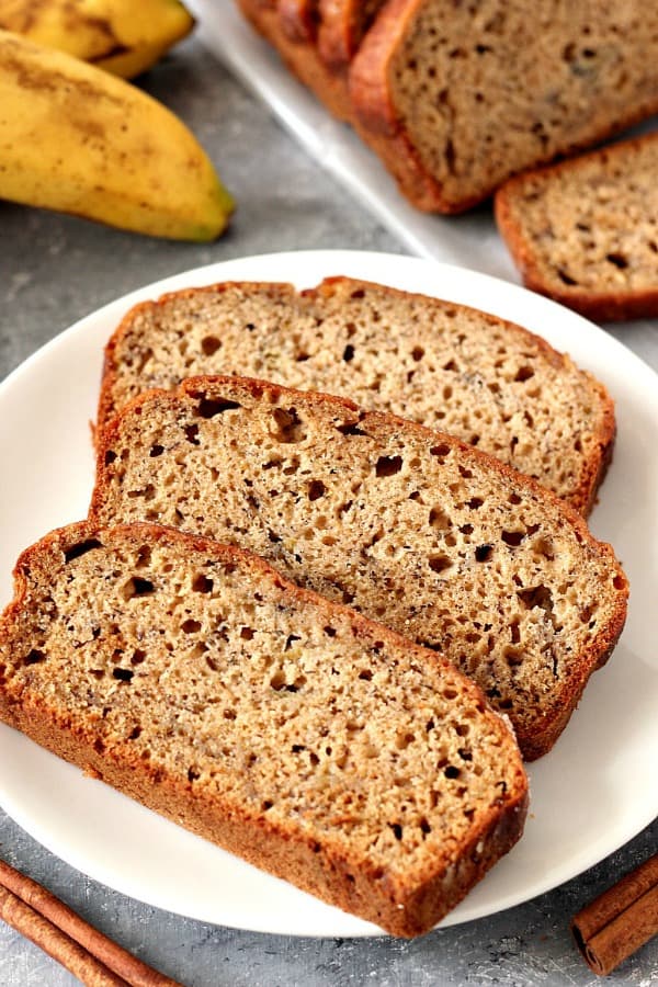 Cinnamon Sugar Banana Bread Sliced on Plate.