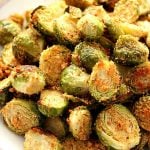 Roasted Brussels sprouts on a white plate.