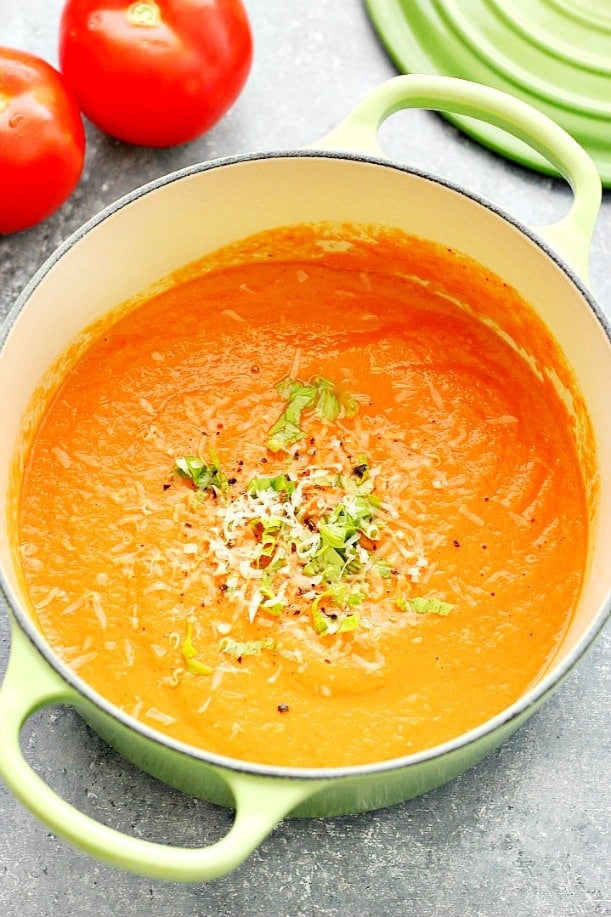 Overhead shot of tomato soup in soup pot.