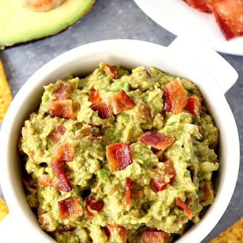 Bacon guacamole in white serving bowl.