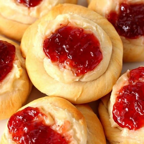 Cream Cheese Danish with strawberry jam on plate.