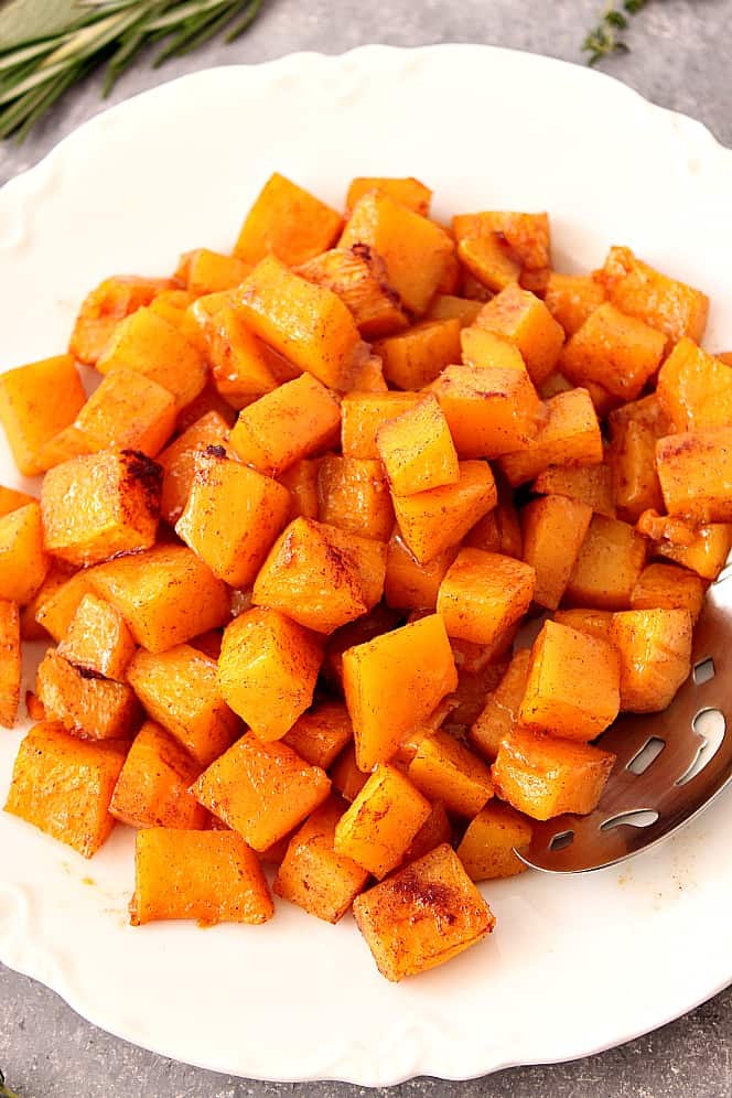 Roasted Butternut Squash on a white plate.