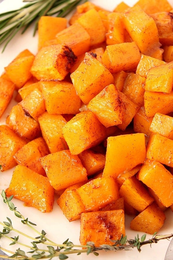 Cubed and roasted squash on a plate.