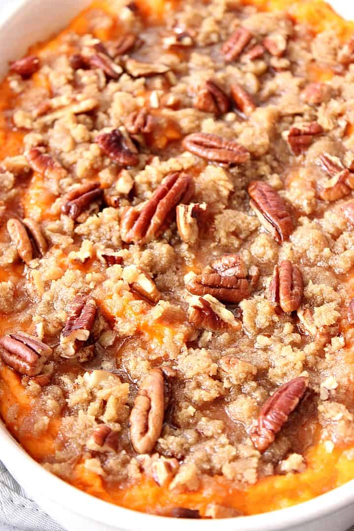 Close up on pecan and brown sugar topping on the sweet potato casserole.