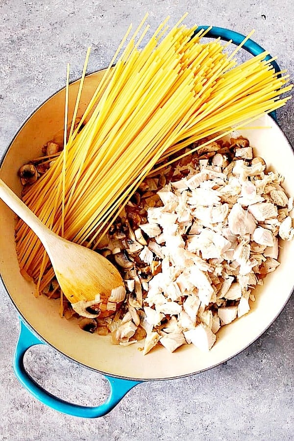 Ingredients for One Pot Turkey Tetrazzini in a skillet.