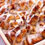 Casserole with cinnamon rolls in a baking dish.
