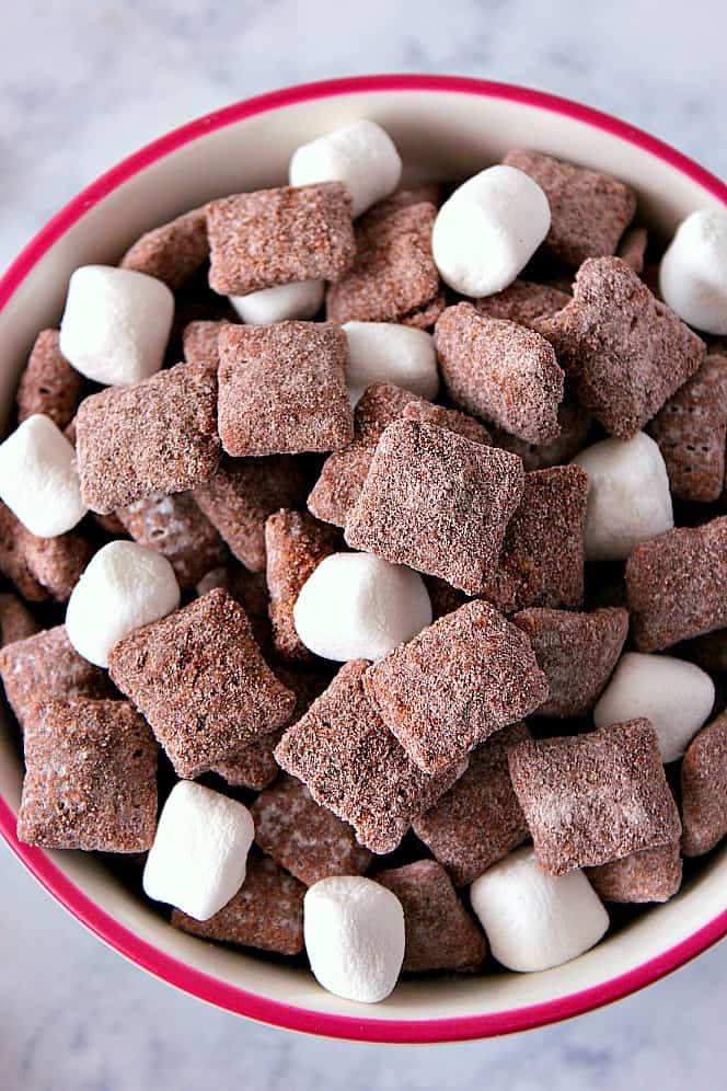 Hot Cocoa Muddy Buddies Recipe - rice cereal coated with milk chocolate and tossed in hot cocoa mix! Quick and easy snack idea to munch on this winter! Hot Cocoa Muddy Buddies Recipe - rice cereal coated with milk chocolate and tossed in hot cocoa mix! Quick and easy snack idea to munch on this winter!