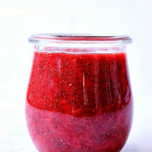 Strawberry jam in glass jar.