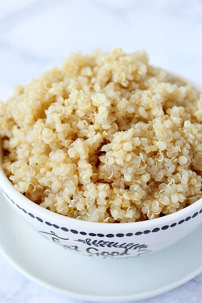 Side shot of cooked quinoa in a bowl. 