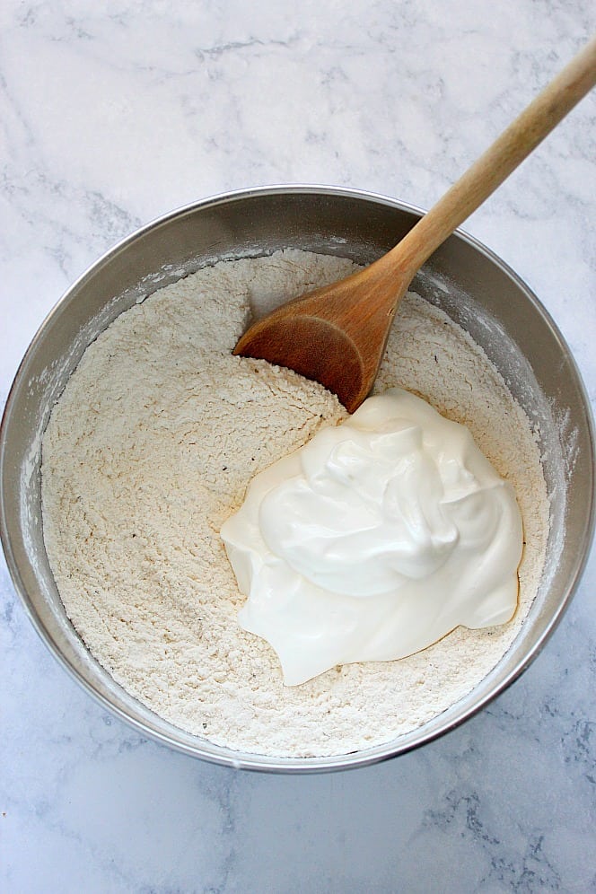 flour and sour cream in a mixing bowl