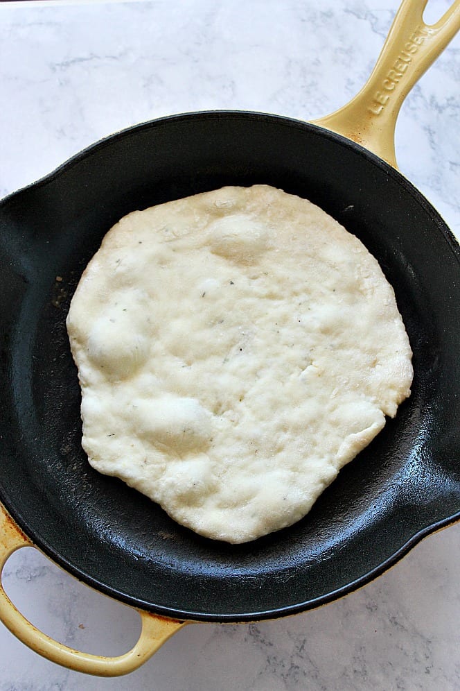 frying flatbread in skillet cast iron
