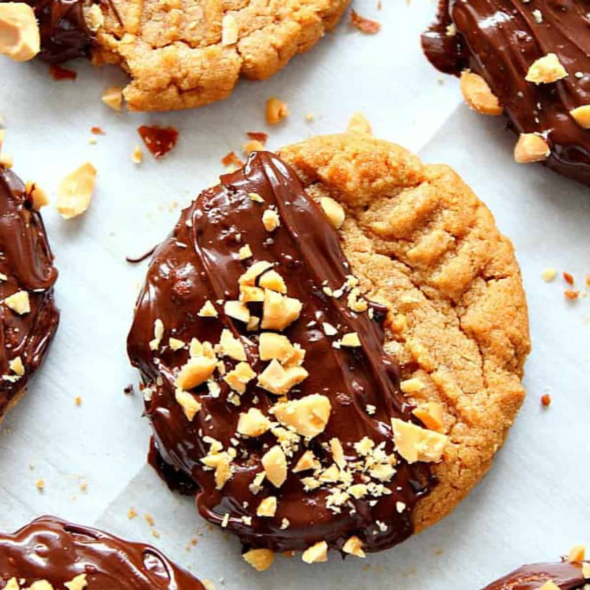 Chocolate peanut butter cookies on a parchment paper.