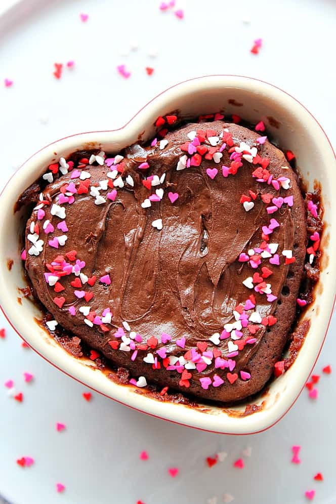 Chocolate Mug Cake for Two Recipe - fluffy and soft chocolate cake cooked in microwave! Perfect little treat that comes together in just under 5 minutes. chocolate cake in heart ramekin