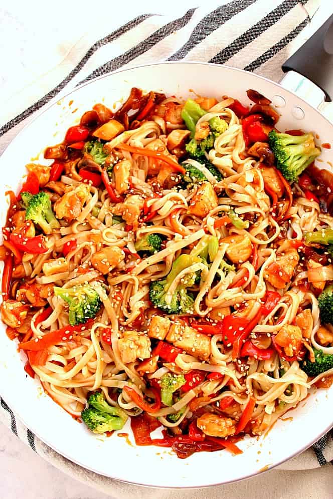 stir fry with noodles in skillet