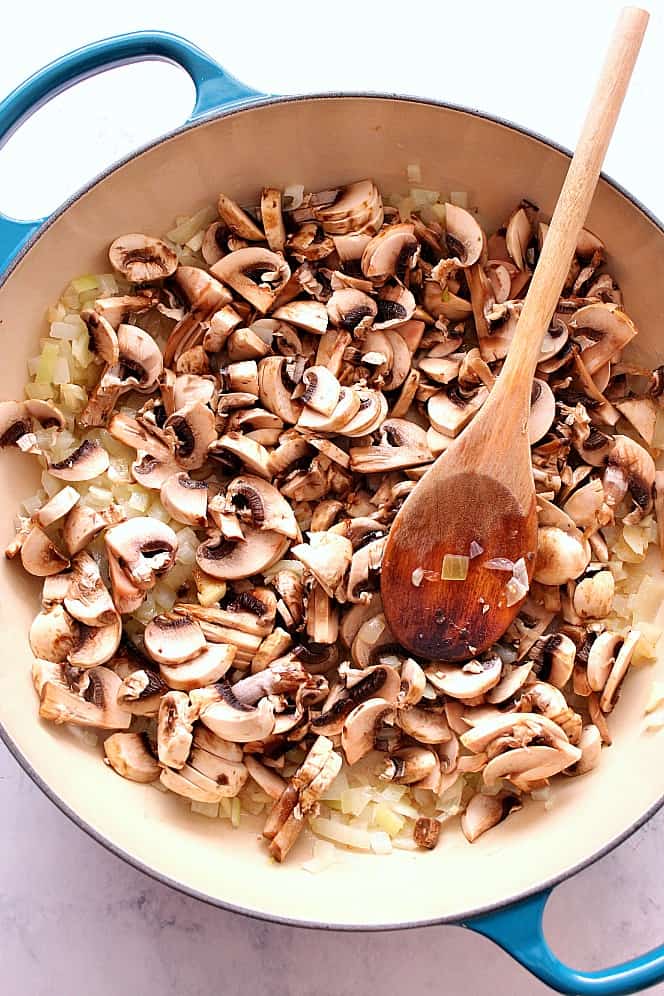 mushrooms cooking in skillet