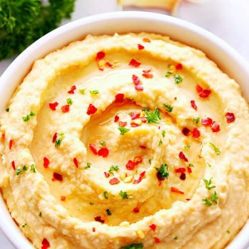 Easy Hummus without tahini in a dip bowl.