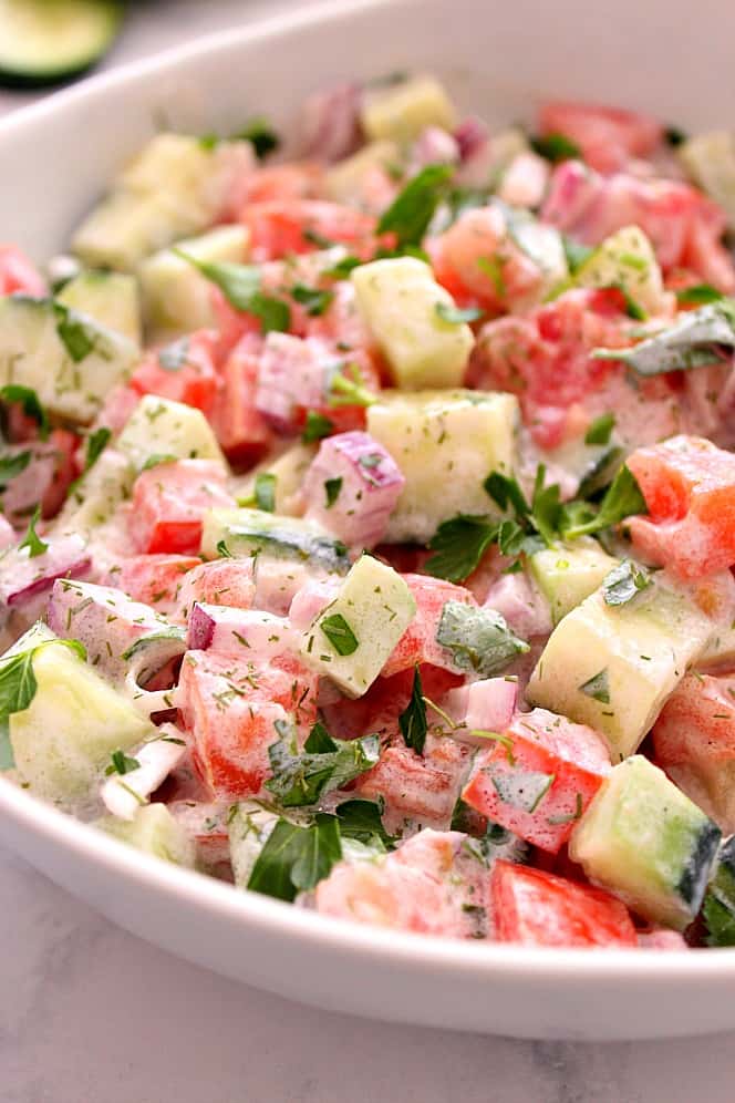 creamy cucumber salad in bowl