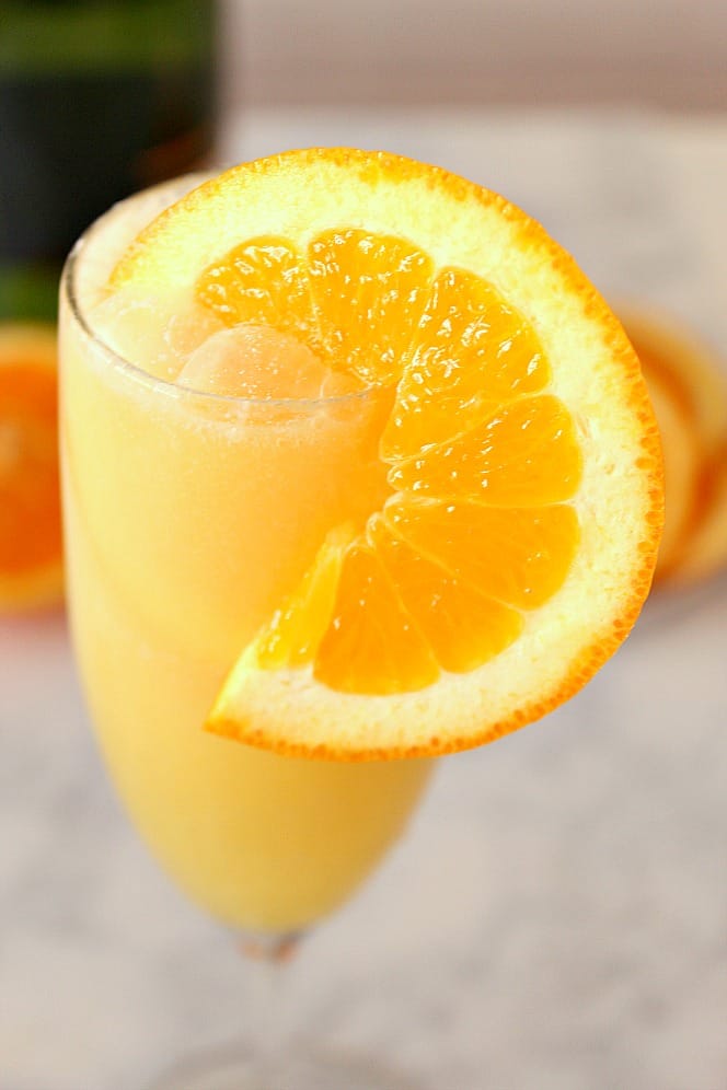 orange mimosa with slice of orange