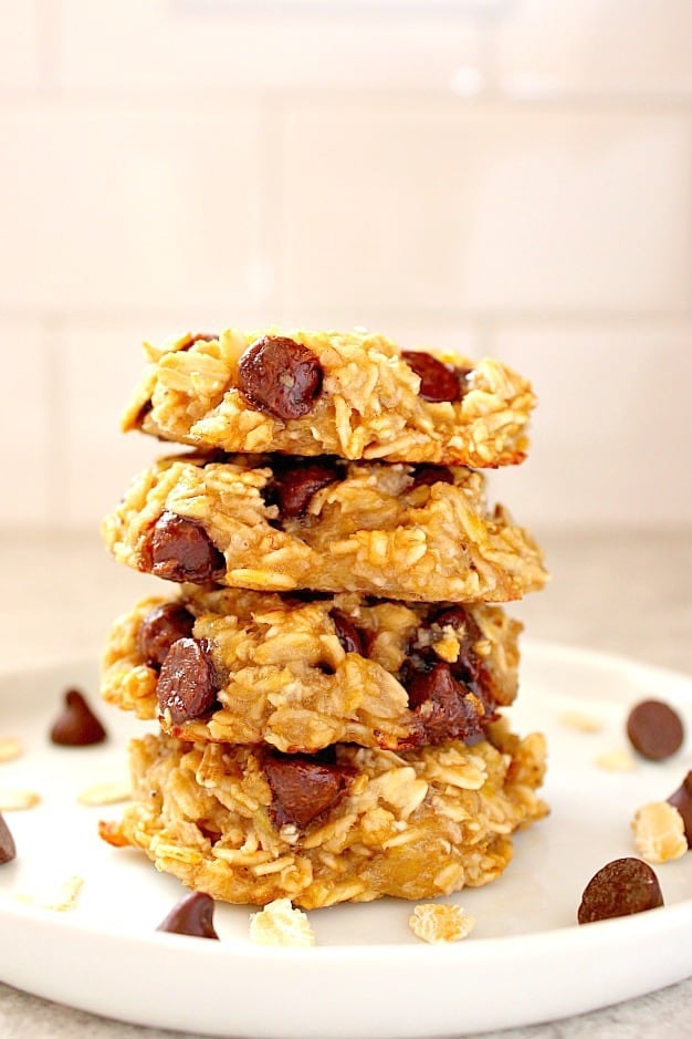 oatmeal cookies with chocolate chips stacked on plate