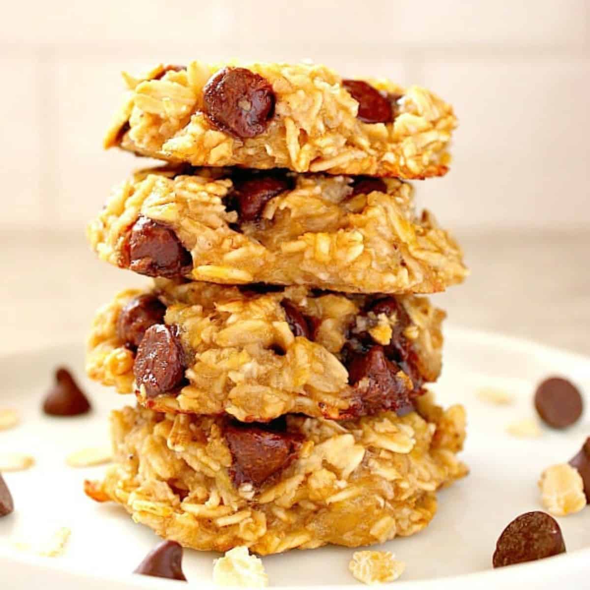 Oatmeal banana cookies stacked on plate.