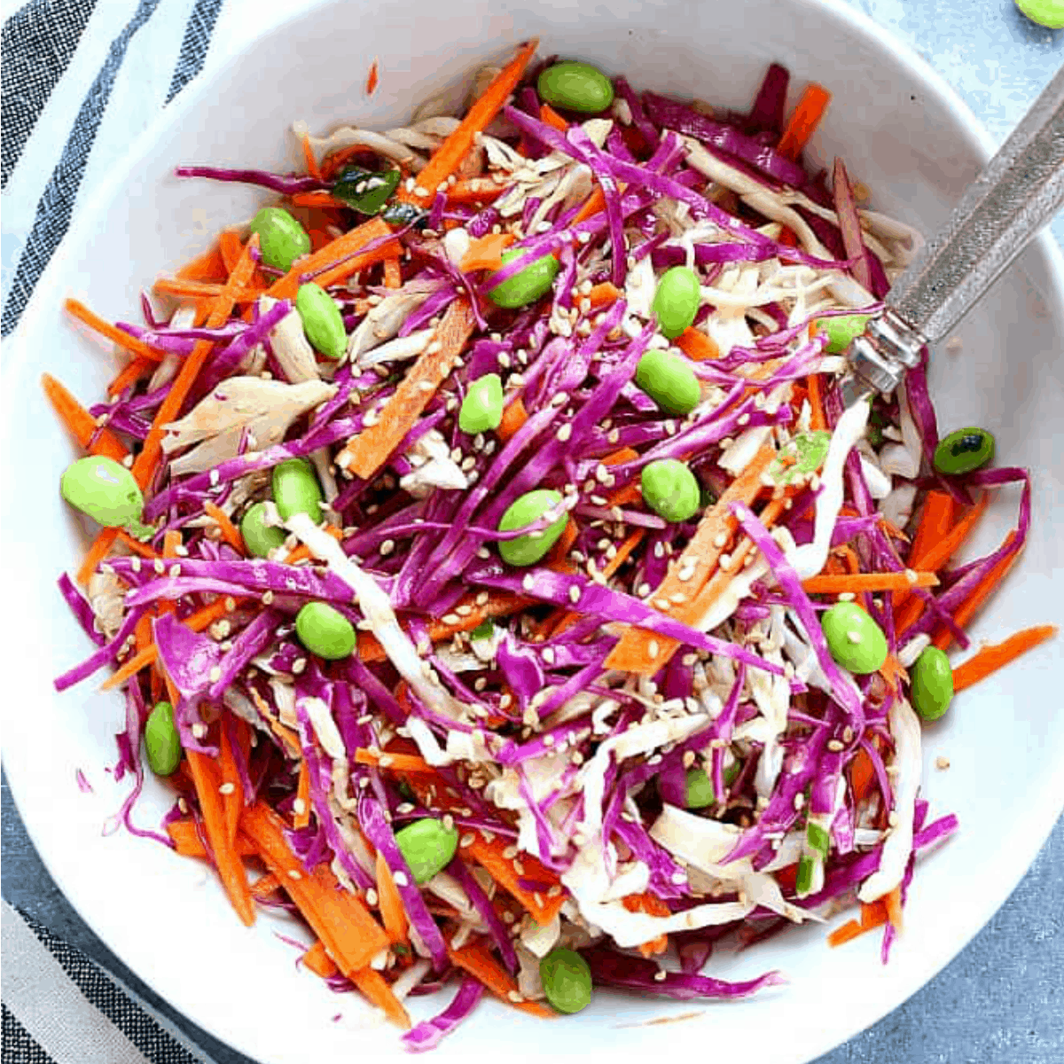 Asia slaw in a white bowl.