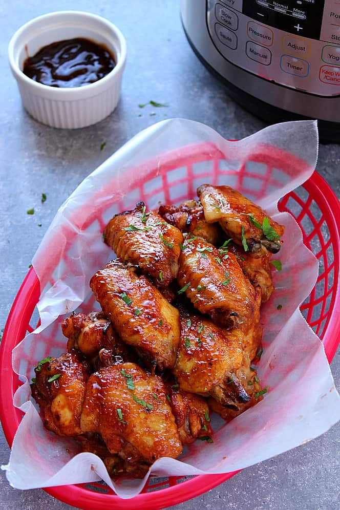 bbq chicken wings on red basket