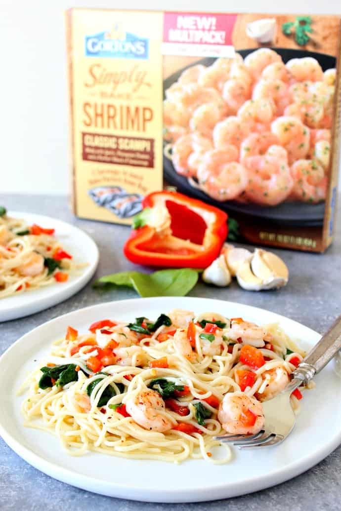 Shrimp scampi served on white plate with Gorton's Seafood box in the background. 