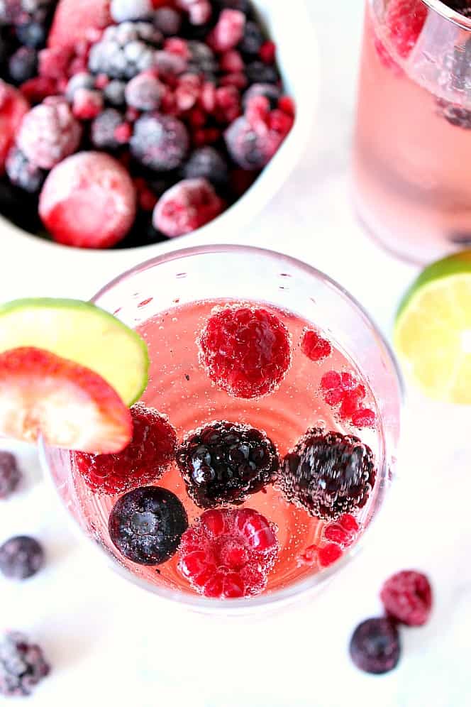 Overhead shot of sangria made with rose wine and frozen berries.