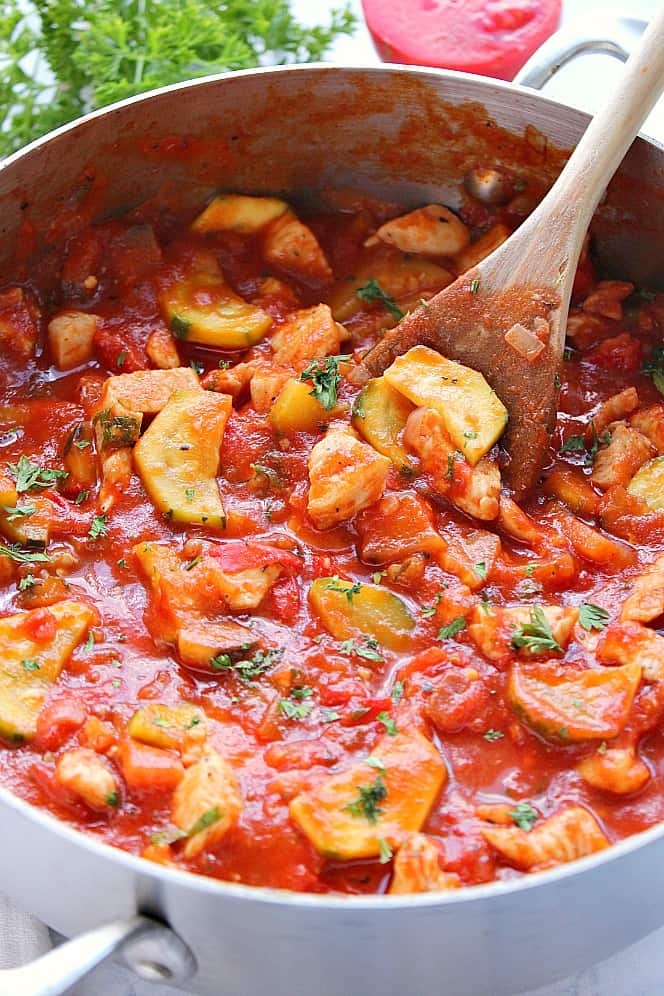 Side close up shot of ratatouille made in one pan. 