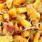 Roasted potatoes on a plate.