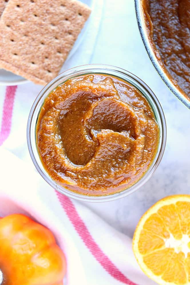 Overhead shot of pumpkin butter in glass jar.