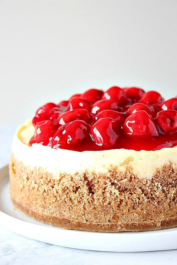 Instant Pot Cheesecake on a white plate.