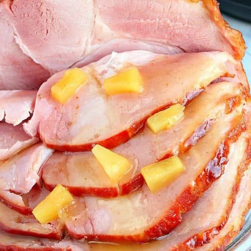 Ham with pineapple on a platter.
