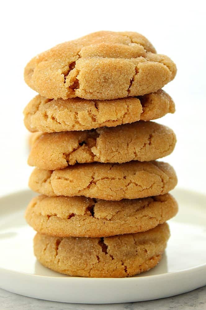 Seven peanut butter cookies stacked up on each other. 