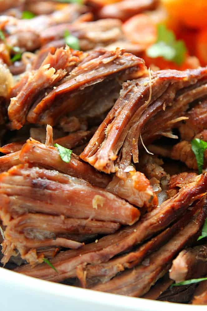 Close up on shredded pot roast beef. 