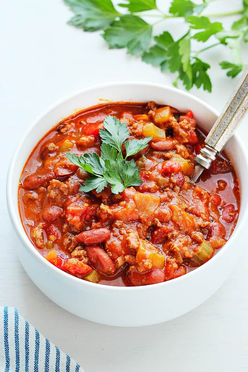 Instant Pot beef chili in a white bowl.