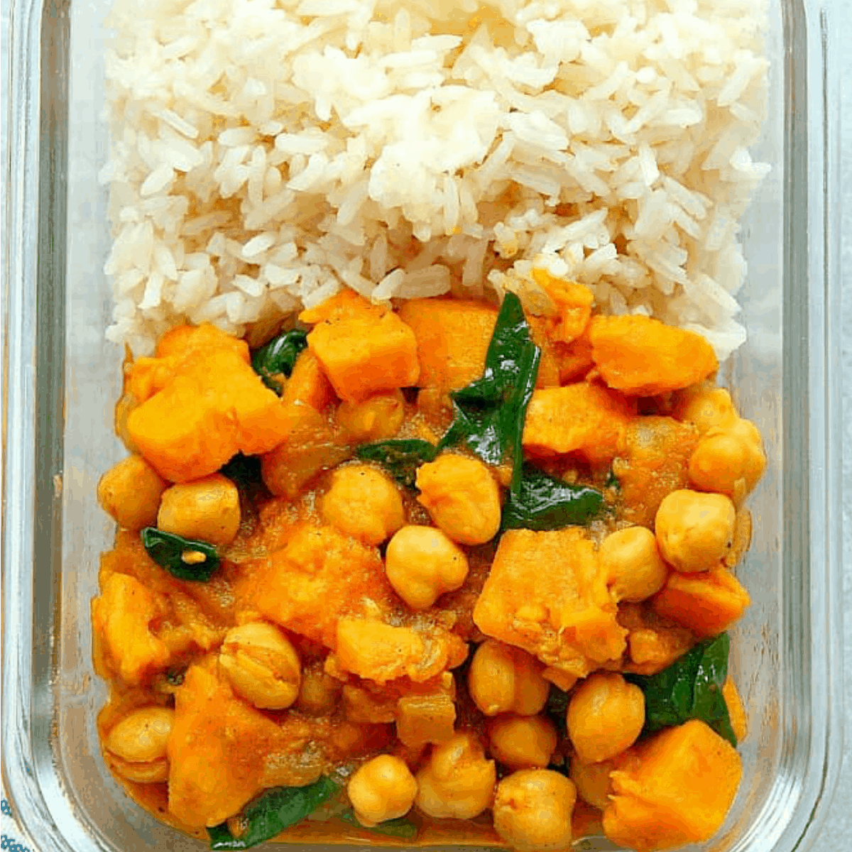 Sweet potato curry with rice in meal prep dish.