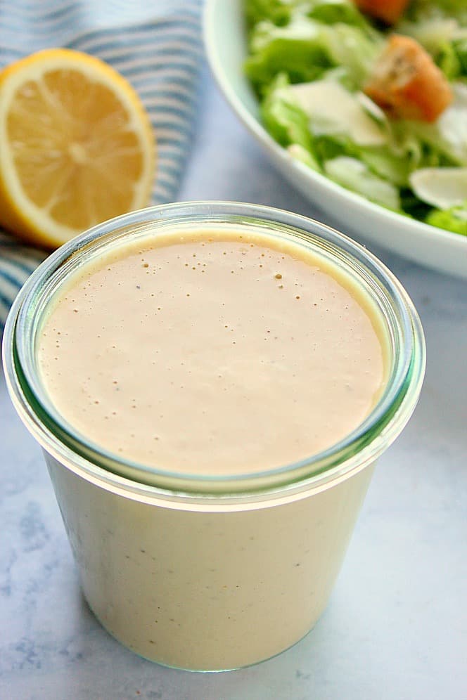 Caesar Salad Dressing in a medium glass jar.