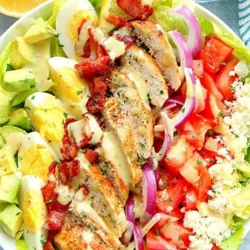 Cobb salad with chicken and bacon in a bowl.