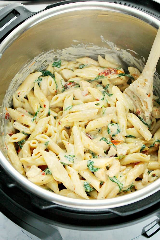 Side shot of creamy chicken penne pasta in the Instant Pot.