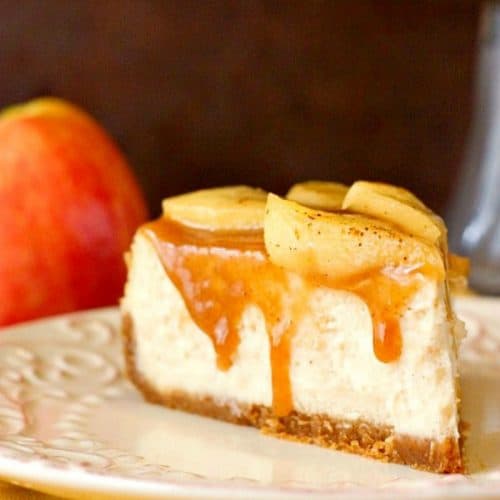 Slice of cheesecake with caramel on a plate.