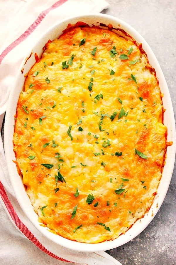 Hashbrown Casserole in oval baking dish.