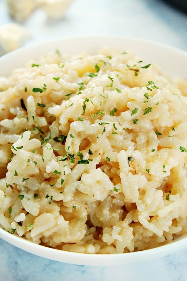 Instant Pot Risotto in a white bowl.