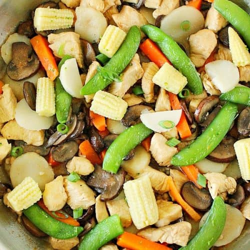 Moo Goo Gai Pan in stainless steel pan.