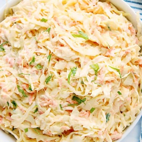Creamy Coleslaw in large white salad bowl.