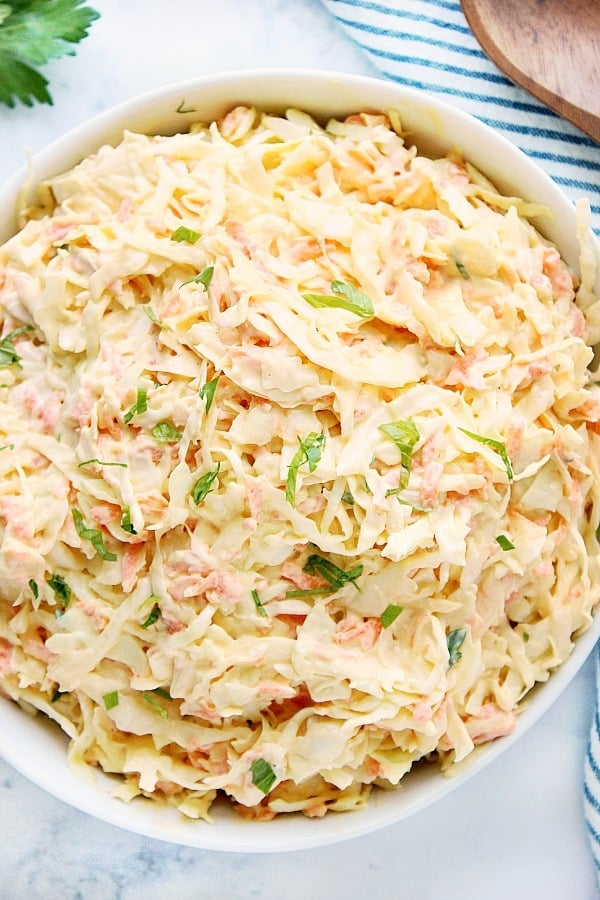 Creamy Coleslaw in large white salad bowl.