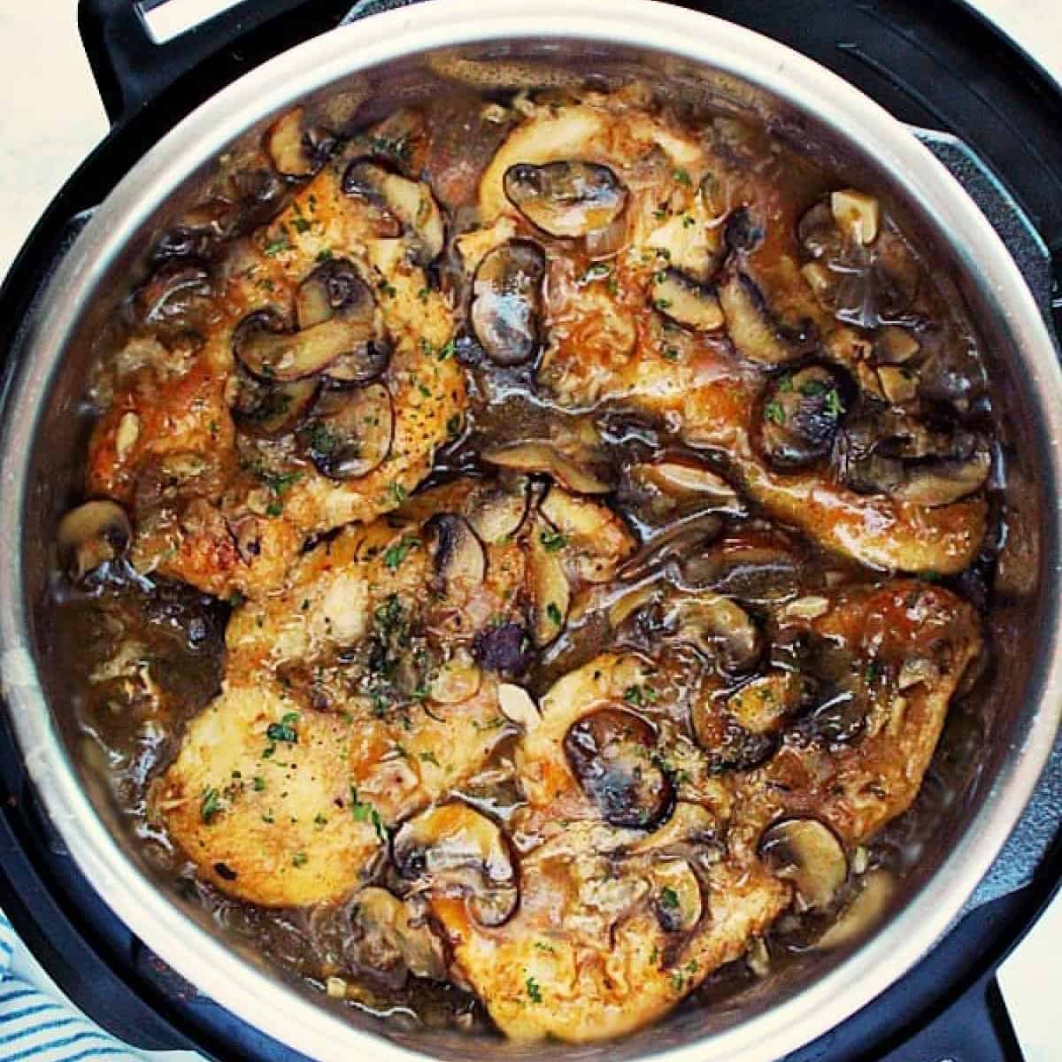 Square image of chicken Marsala dish in the Instant Pot.