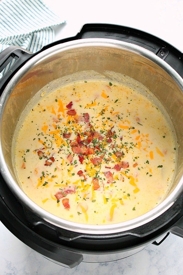 Instant Pot Potato soup with cheddar and bacon in the pressure cooker.