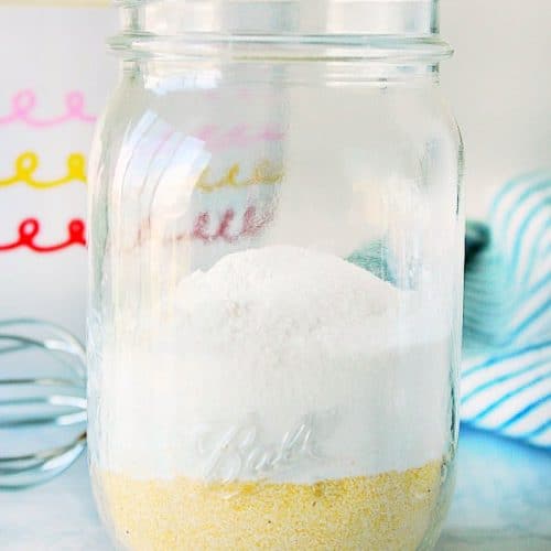 Homemade Cornbread Mix in a glass jar.