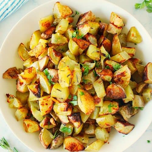Roasted Rosemary Potatoes in a white bowl.